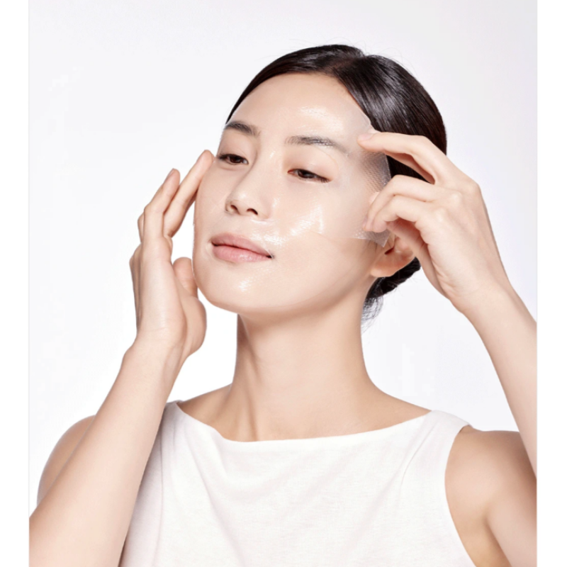 applying REJURAN Ampoule Infused Lifting Mask, powered by c-PDRN